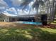 Expansive backyard with in ground pool at 2215 Toniwood Ln, Palm Harbor, FL 34685