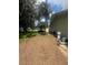 Yard with pool equipment at 2215 Toniwood Ln, Palm Harbor, FL 34685