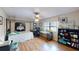 Spacious bedroom with stylish chandelier, lots of natural light and home office nook at 2215 Toniwood Ln, Palm Harbor, FL 34685