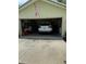 Attached garage with ample space for parking and storage at 2215 Toniwood Ln, Palm Harbor, FL 34685