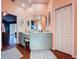 This bathroom features double sinks, a large mirror, and a storage closet at 22804 Willow Lakes Dr, Lutz, FL 33549