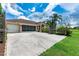 Charming single-Gathering home with a long driveway and screened-in garage at 23075 Hayman Rd, Brooksville, FL 34602