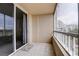 Spacious balcony with tiled flooring and views of the surrounding area at 2333 Feather Sound Drive # A409, Clearwater, FL 33762