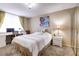 Serene bedroom with ample natural light, a stylish desk, and closet at 2333 Feather Sound Drive # A409, Clearwater, FL 33762