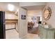 View of kitchen, dining area and living room, with elegant furnishings and decor at 2333 Feather Sound Drive # A409, Clearwater, FL 33762