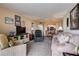 Cozy living room featuring neutral tones and comfortable seating arrangements and decor at 2333 Feather Sound Drive # A409, Clearwater, FL 33762