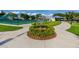 Beautifully landscaped common grounds with walking paths, seating areas and recreational activities for outdoor enjoyment at 2430 Florentine Way # 40, Clearwater, FL 33763