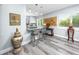 Cozy eat-in kitchen with granite countertop, breakfast bar, and decorative art at 2430 Florentine Way # 40, Clearwater, FL 33763