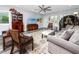 Comfortable living room with wood-look floors, neutral decor, and a ceiling fan at 2430 Florentine Way # 40, Clearwater, FL 33763