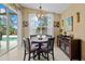 Casual dining area features view and access to lanai and pool area at 2511 Groveway Dr, Valrico, FL 33596