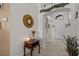 Elegant entryway featuring an arched doorway, tile flooring, and tasteful decor, offering a glimpse of the home's interior at 2511 Groveway Dr, Valrico, FL 33596
