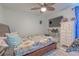Cozy bedroom with a wooden bed frame, and a flat screen tv at 2533 Blossom Lake Dr, Holiday, FL 34691