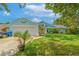 Charming single-Gathering home with a well-maintained lawn and colorful exterior design at 2533 Blossom Lake Dr, Holiday, FL 34691