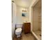 Bathroom features a shower, toilet, and vanity with sink at 2800 13Th N Ave, St Petersburg, FL 33713