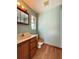 Bathroom features a vanity with sink, toilet and window at 2800 13Th N Ave, St Petersburg, FL 33713