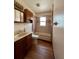 A full bathroom features a tub with shower, vanity with sink and wood flooring at 2800 13Th N Ave, St Petersburg, FL 33713