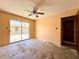 A bedroom with sliding glass door leads to the outside at 2800 13Th N Ave, St Petersburg, FL 33713