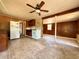 A kitchen with white appliances and wood paneled walls at 2800 13Th N Ave, St Petersburg, FL 33713