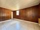Living room with wood paneled walls at 2800 13Th N Ave, St Petersburg, FL 33713