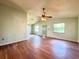 Bright living room with vaulted ceilings, modern ceiling fan, and wood-look tile flooring at 2800 13Th N Ave, St Petersburg, FL 33713