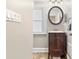 Bathroom vanity with round mirror and modern lighting at 304 21St N Ave, St Petersburg, FL 33704