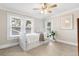 Cozy bedroom featuring twin bed, multiple windows, and closet space at 304 21St N Ave, St Petersburg, FL 33704