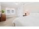 Bedroom with a ceiling fan, closet, and a lamp at 304 21St N Ave, St Petersburg, FL 33704