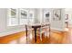Bright dining room with hardwood floors and large windows, providing a welcoming atmosphere for meals at 304 21St N Ave, St Petersburg, FL 33704
