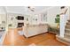 Spacious living room with a fireplace, hardwood floors, and comfortable seating, ideal for relaxation at 304 21St N Ave, St Petersburg, FL 33704