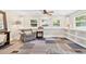Cozy sitting room featuring large windows and built-in shelves, creating a comfortable and functional space at 304 21St N Ave, St Petersburg, FL 33704