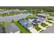 Waterfront homes featuring lush landscaping, tranquil water views, and serene backyard environments at 3326 Woodmont Dr, Parrish, FL 34219
