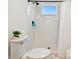 Bright bathroom featuring a white tiled shower with sleek fixtures at 3326 Woodmont Dr, Parrish, FL 34219