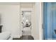 Bright bedroom featuring a slider door, white walls, and natural light at 3326 Woodmont Dr, Parrish, FL 34219