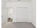 Bedroom with a closet with panel doors at 3326 Woodmont Dr, Parrish, FL 34219