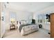 Spacious bedroom with white walls, carpet, shuttered windows, and a walk-in closet at 3326 Woodmont Dr, Parrish, FL 34219
