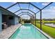 Backyard oasis featuring a sparkling pool and spa at 3326 Woodmont Dr, Parrish, FL 34219