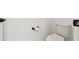 Powder room featuring an efficient toilet and functional design at 3326 Woodmont Dr, Parrish, FL 34219