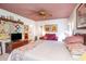 Comfortable bedroom with ceiling fan, wood furnishings, and decorative touches for a relaxing atmosphere at 3335 Foxridge Cir, Tampa, FL 33618