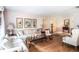 Bright living room with wood floors, comfortable seating, and elegant decor at 3335 Foxridge Cir, Tampa, FL 33618