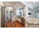 Well-designed kitchen with granite countertops, stainless steel appliances, and an open layout at 3437 Aspen Trl, Clearwater, FL 33761
