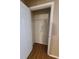 View of the closet with rod and shelf for storage at 36137 Lake Chase Blvd # 102, Zephyrhills, FL 33541