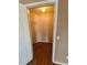 A bedroom closet offering ample space with a simple rod and shelf, ideal for organized storage at 36137 Lake Chase Blvd # 102, Zephyrhills, FL 33541