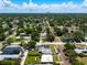 Aerial shot featuring a well maintained single Gathering home with views of downtown in the distance at 400 53Rd N St, St Petersburg, FL 33710