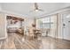 Inviting dining area open to the living room, bathed in natural light, enhancing the warm ambiance at 400 53Rd N St, St Petersburg, FL 33710