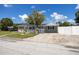 Charming single-story home with well-maintained lawn, complemented by lush landscaping and inviting curb appeal at 400 53Rd N St, St Petersburg, FL 33710