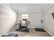 Well-lit interior features a desk, chair, and door, ideal for a home office or study space at 400 53Rd N St, St Petersburg, FL 33710