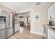 Modern kitchen with stainless steel appliances, open layout, and a convenient connection to the dining and living areas at 400 53Rd N St, St Petersburg, FL 33710