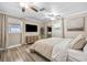 Serene main bedroom featuring hardwood floors, neutral decor, and plenty of natural light at 400 53Rd N St, St Petersburg, FL 33710