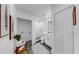 Modern bathroom featuring sleek fixtures, a walk-in shower, and contemporary decor with stylish accents at 4112 W Lawn Ave, Tampa, FL 33611