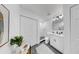 Stylish bathroom features sleek vanity, walk-in shower, and contemporary finishes at 4112 W Lawn Ave, Tampa, FL 33611